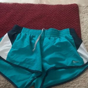 Nike athletic shorts good condition elastic in panty is cut does not show